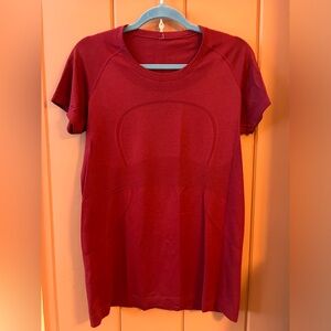 Lululemon Swiftly Tech Shirt Sleeve shirt size 12 in cranberry